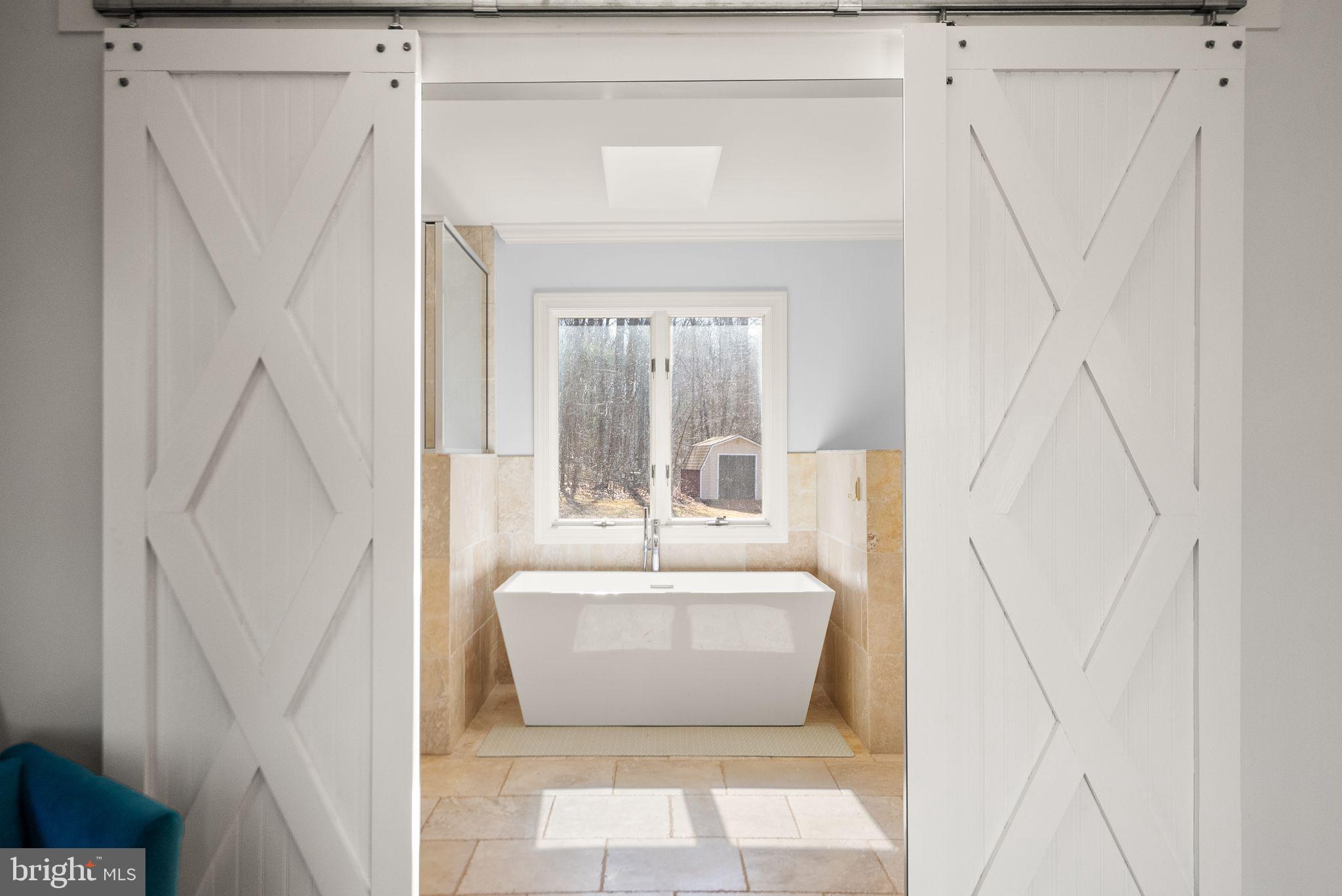 8089 Moormont Road Rapidan, VA 22733 - Photo 32 of 88 a white bath tub sitting next to a white sink