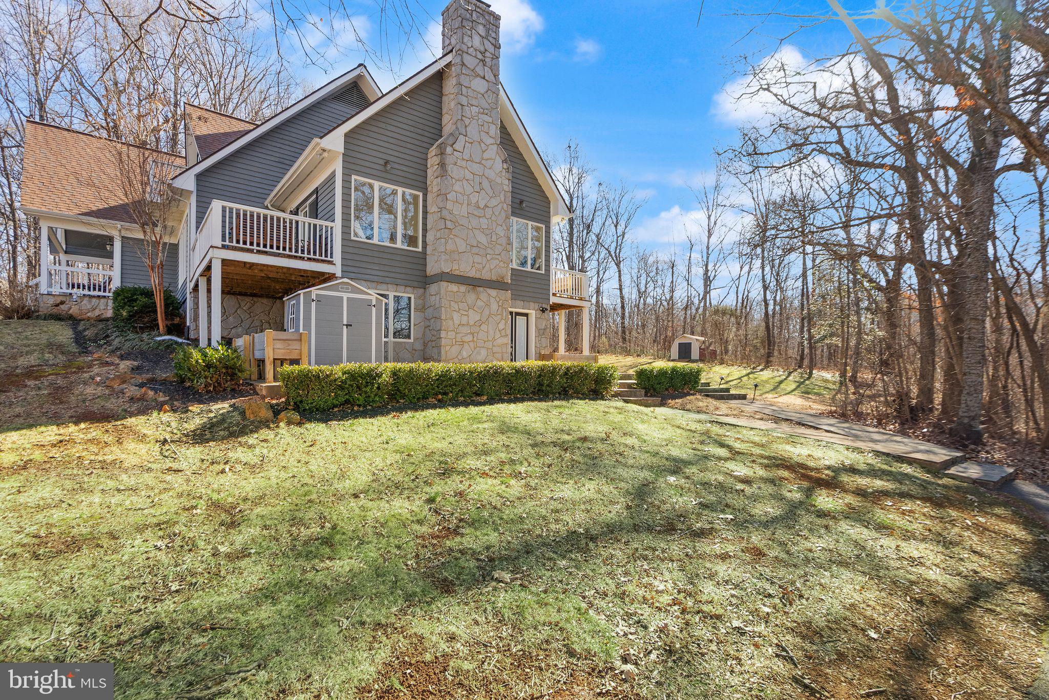 8089 Moormont Road Rapidan, VA 22733 - Photo 4 of 88 a view of a house with a yard