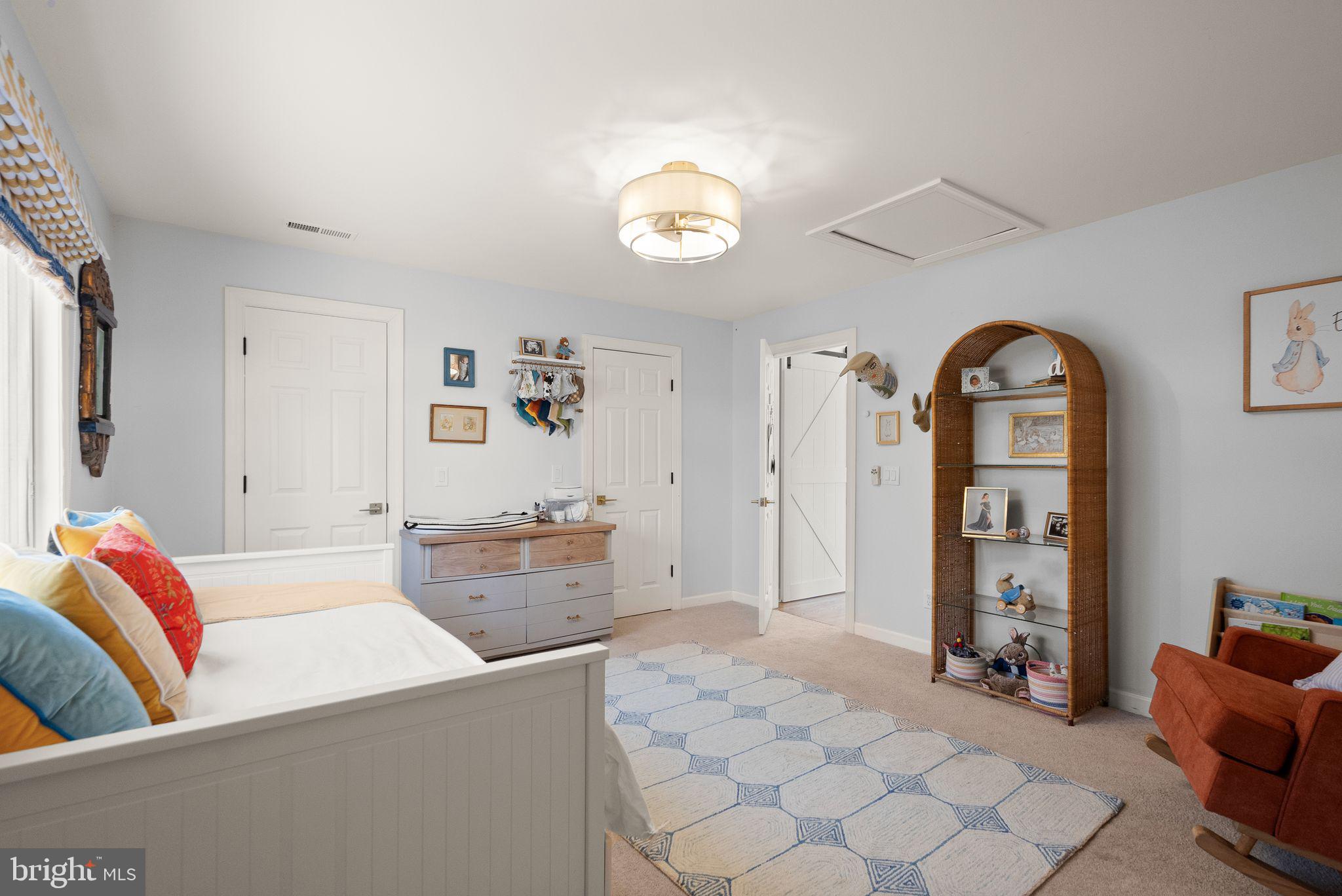 8089 Moormont Road Rapidan, VA 22733 - Photo 48 of 88 a bedroom with a bed and a couch