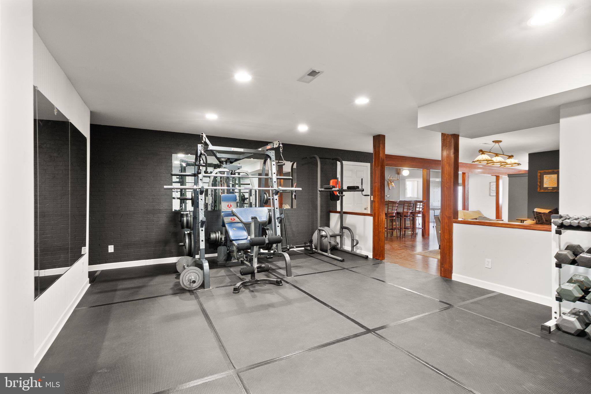 8089 Moormont Road Rapidan, VA 22733 - Photo 54 of 88 a view of a room with gym equipment