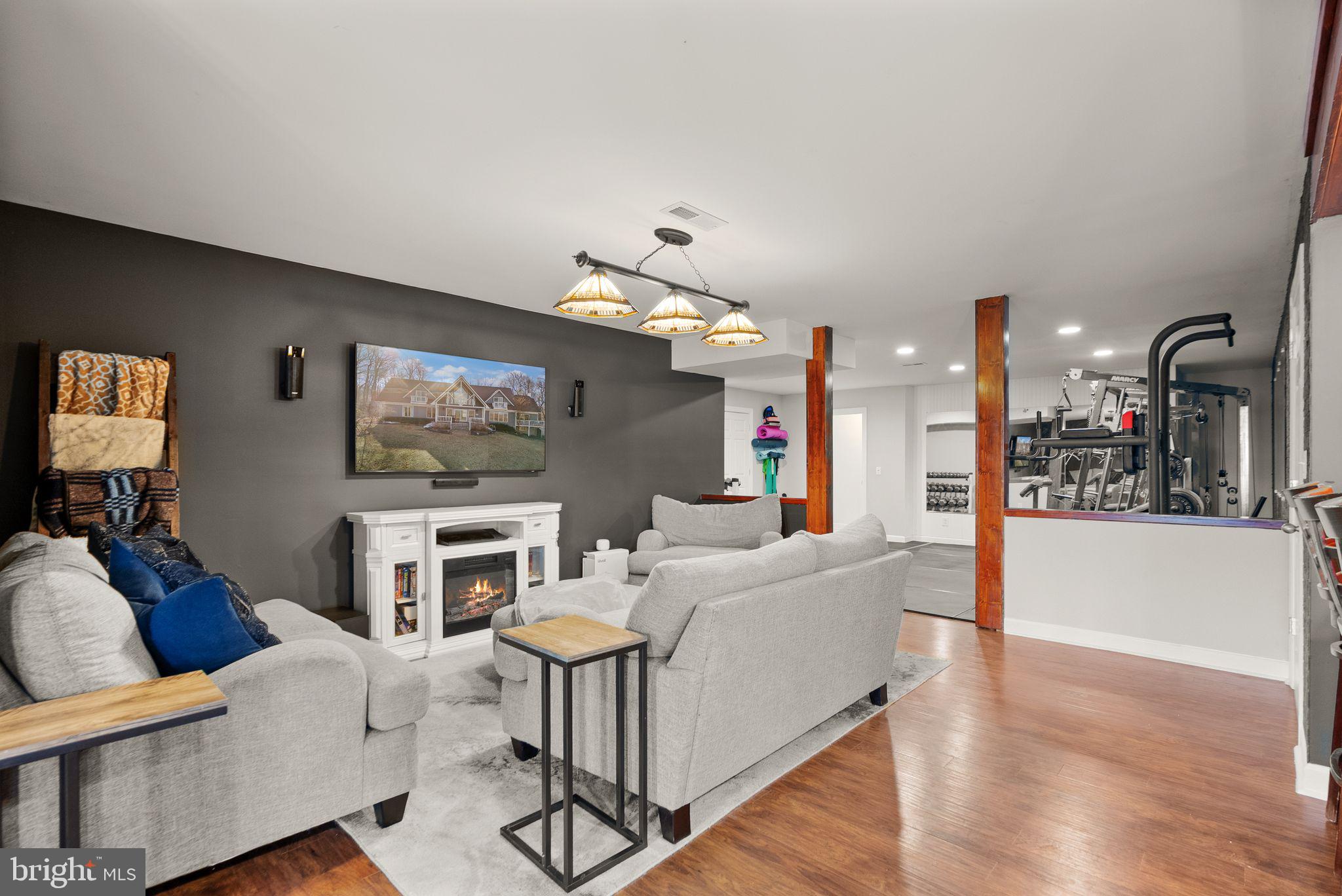 8089 Moormont Road Rapidan, VA 22733 - Photo 58 of 88 a living room with furniture and a flat screen tv