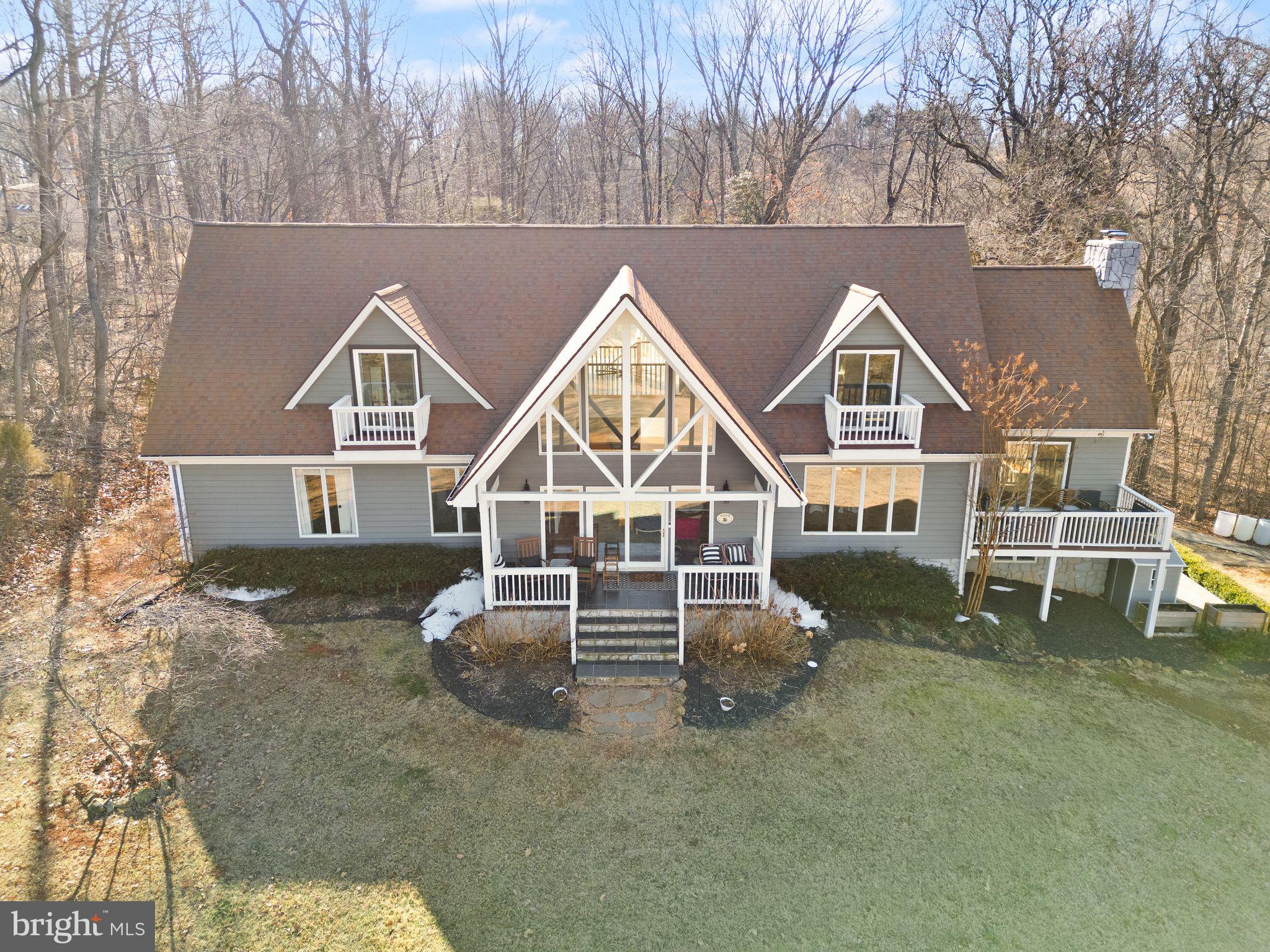 8089 Moormont Road Rapidan, VA 22733 - Photo 83 of 88 a front view of a house with table and chairs
