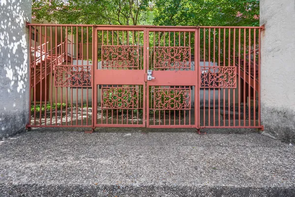 a view of a gate with a fence