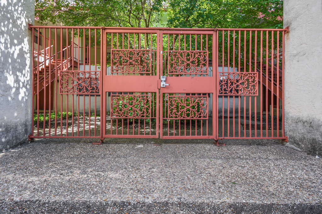 706 West 22nd Street, Unit 306 Austin, TX 78705 - Photo 16 of 19 a view of a gate with a fence