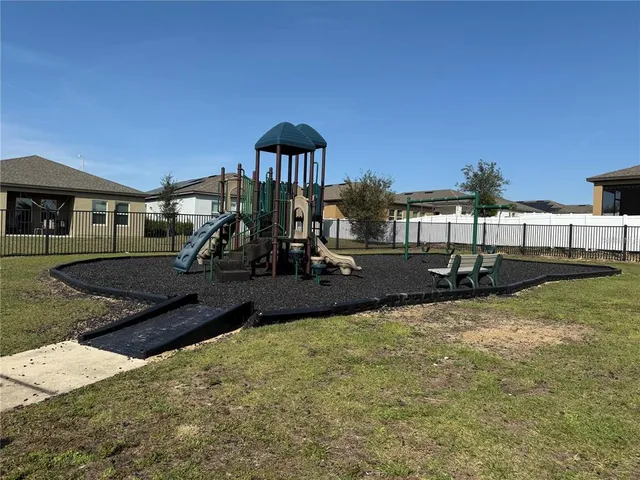 a view of a house with swimming pool