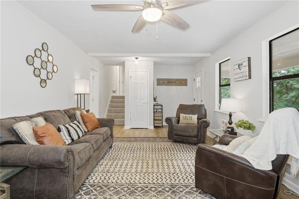404 Brooks Street Dallas, GA 30157 - Photo 5 of 38 a living room with furniture and a couch