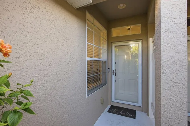 a kitchen with a sink cabinets and stainless steel appliances