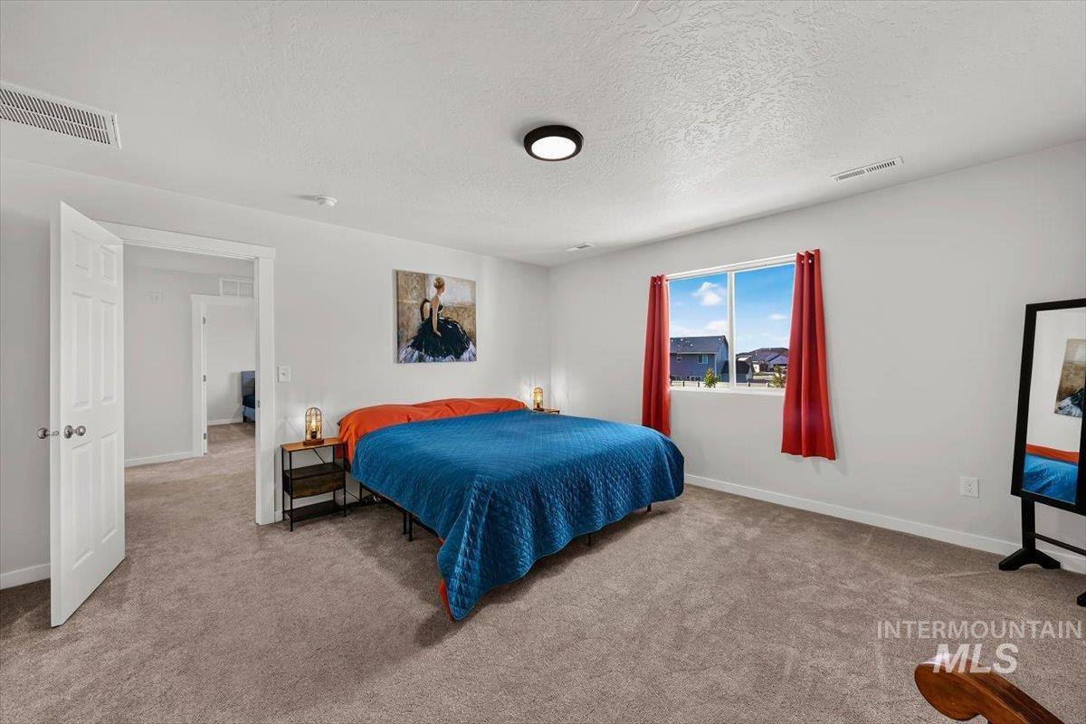 8575 South Foraker Way Kuna, ID 83634 - Photo 24 of 43 Spacious primary suite