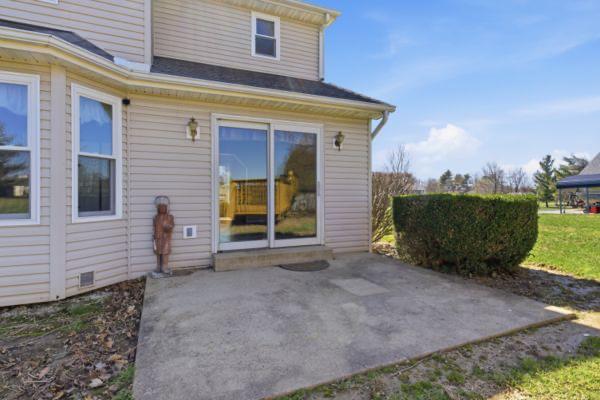 11043 Keeler Road Brookville, IN 47012 - Photo 32 of 64 Patio doors lead out to patio area and adjoining deck to pool.