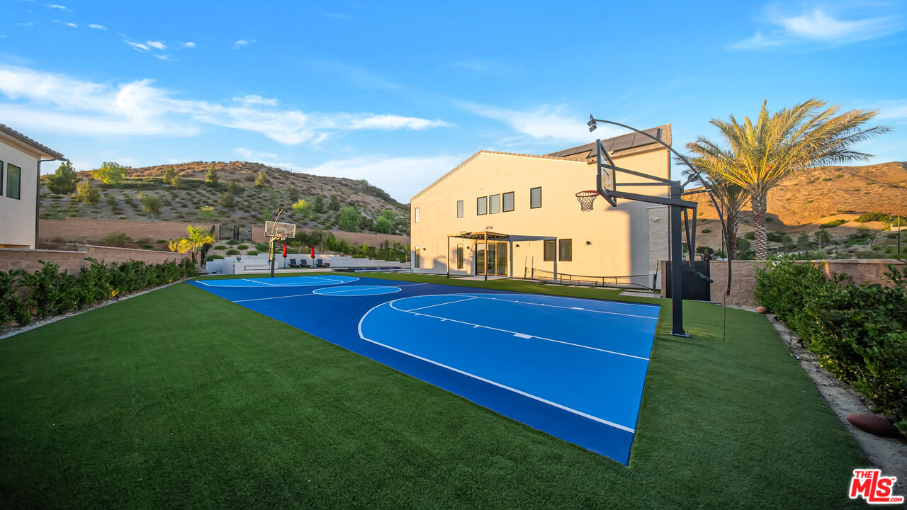12553 Ridgeline Road Porter Ranch, CA 91326 - Photo 20 of 53 a view of a yard with a house