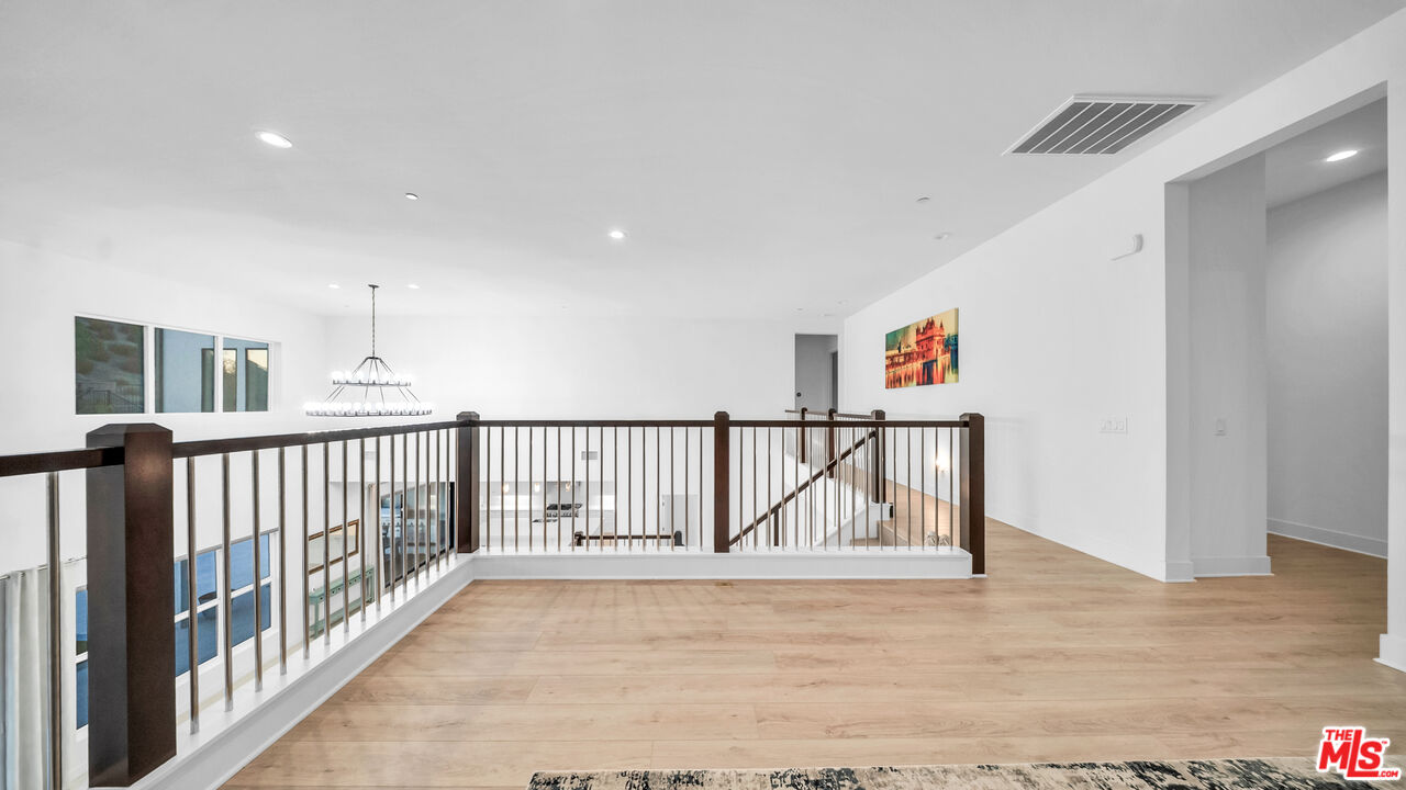 12553 Ridgeline Road Porter Ranch, CA 91326 - Photo 46 of 53 a view of a hallway