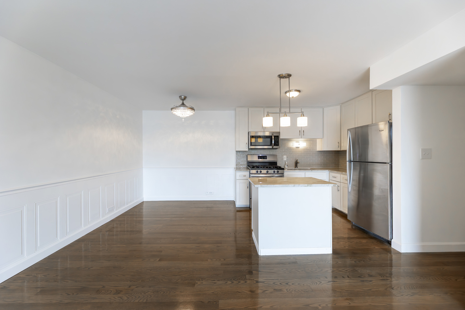 9820 South Pulaski Road, Unit 213 Oak Lawn, IL 60453 - Photo 5 of 15 a kitchen with a refrigerator and a stove top oven
