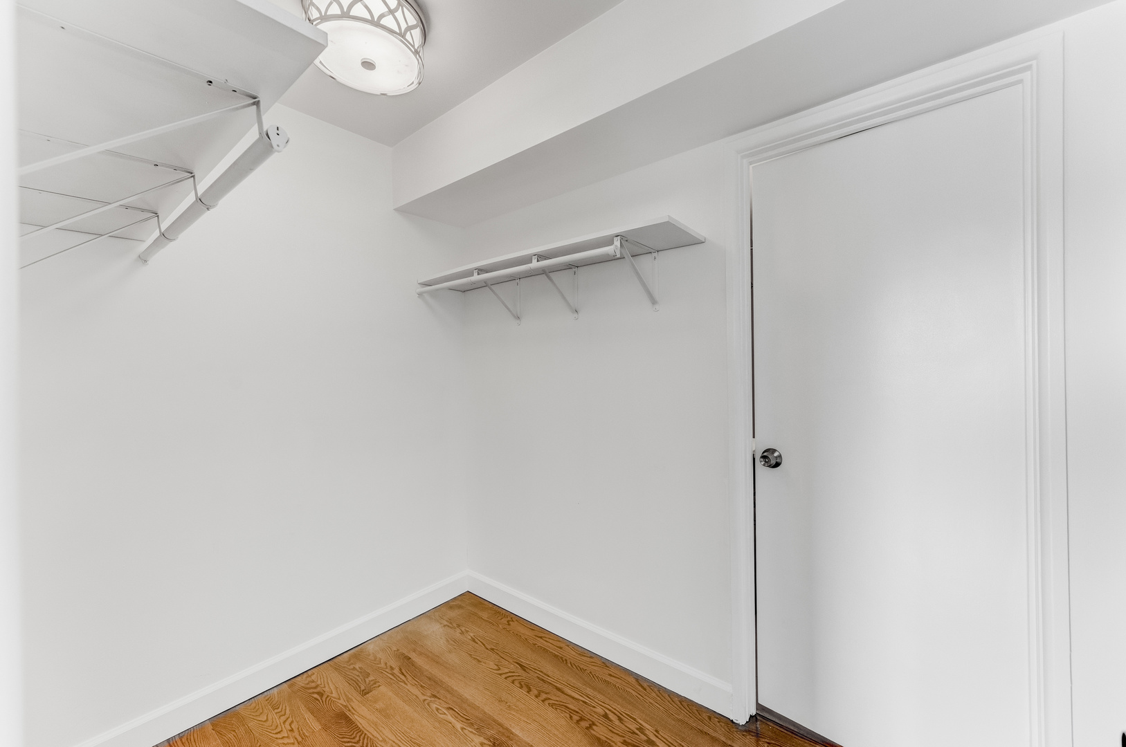 9820 South Pulaski Road, Unit 213 Oak Lawn, IL 60453 - Photo 10 of 15 a view of a room with wooden floor