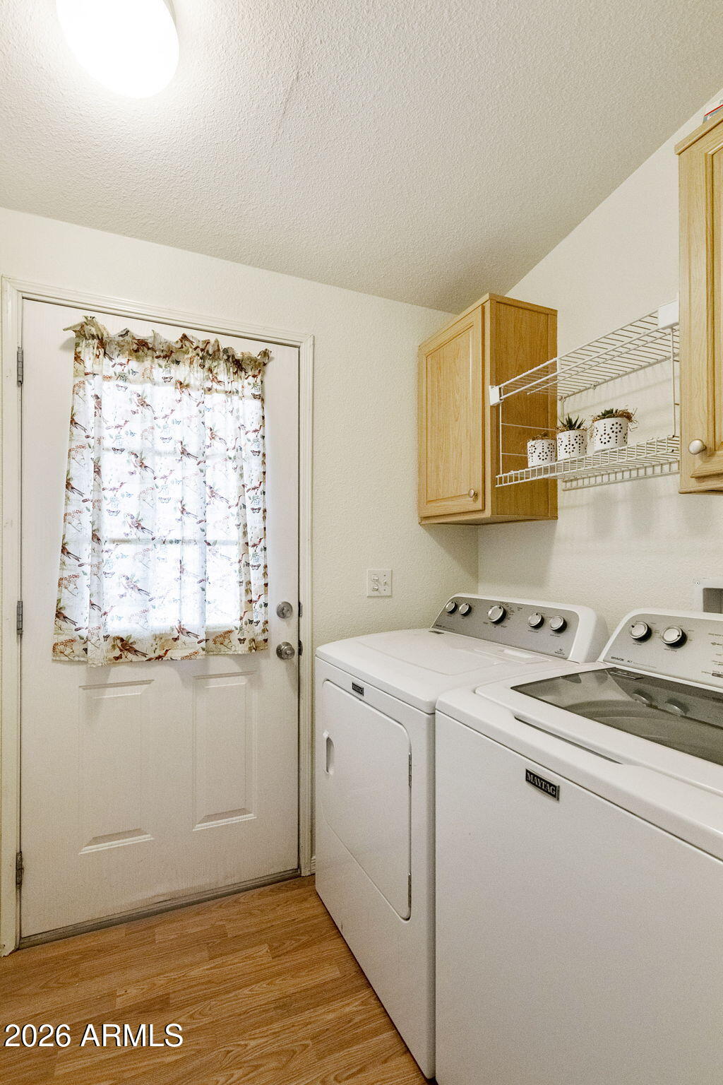 3700 South Tomahawk Road, Unit 93 Apache Junction, AZ 85119 - Photo 11 of 32 a room with storage and utility