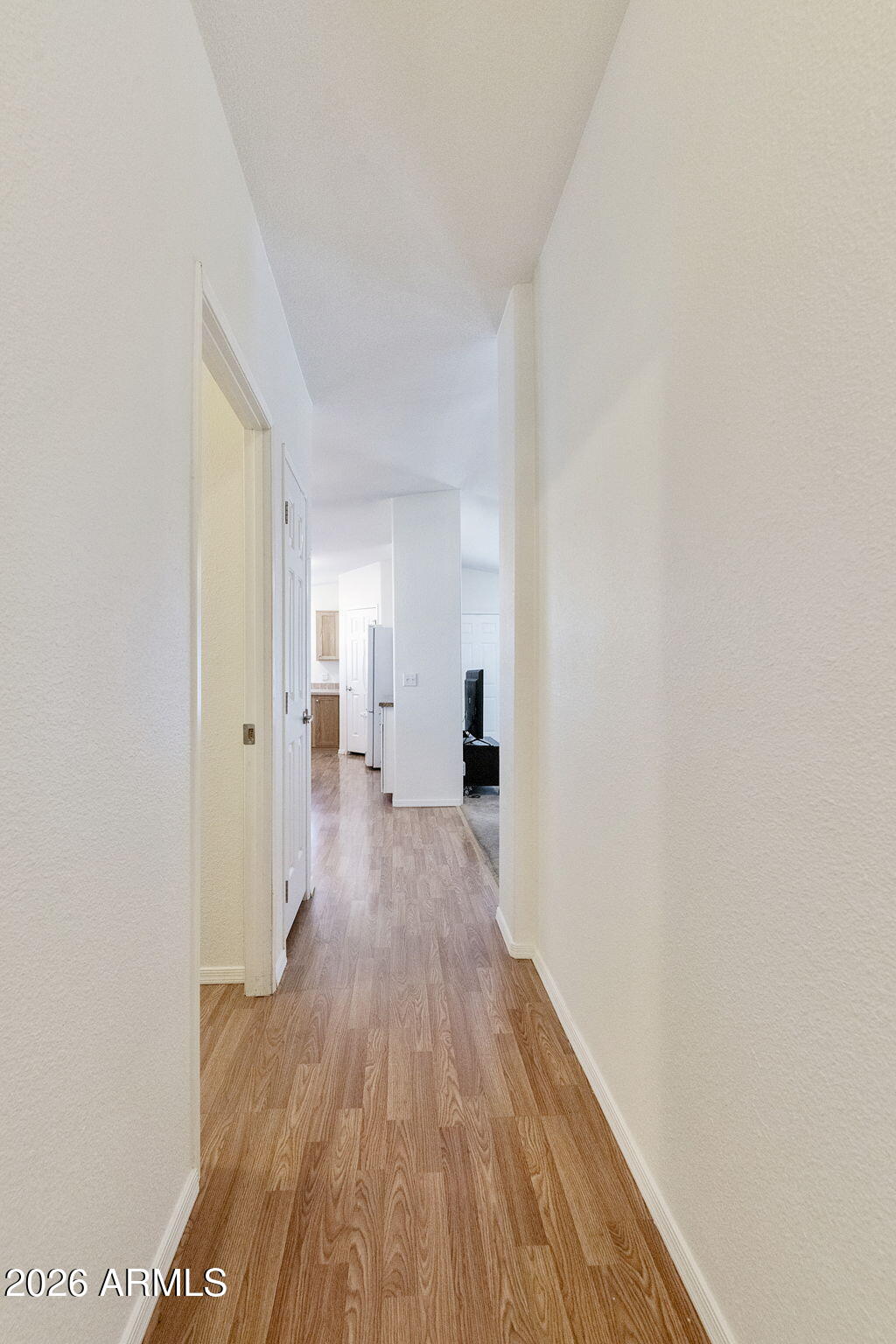 3700 South Tomahawk Road, Unit 93 Apache Junction, AZ 85119 - Photo 22 of 32 a view of a room with wooden floor