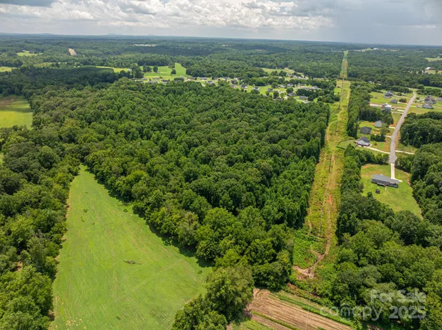 a view of a lake with a city