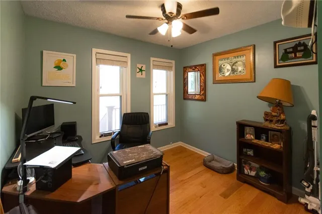 a bedroom with a bed and furniture