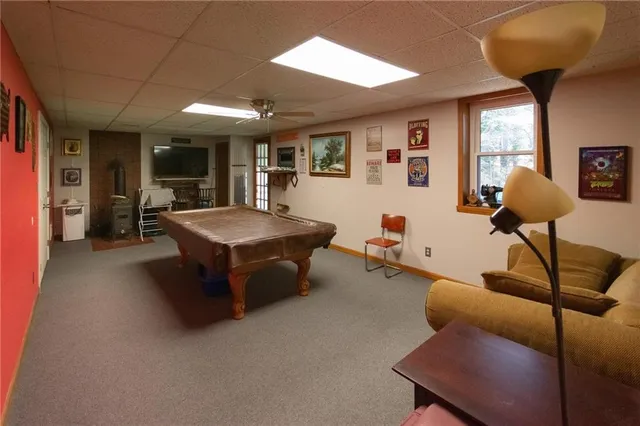 a room with furniture and a large window