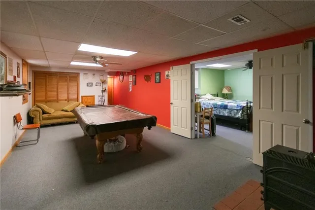 a bedroom with a bed and a table in it