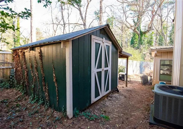 a backyard of a house with seating space