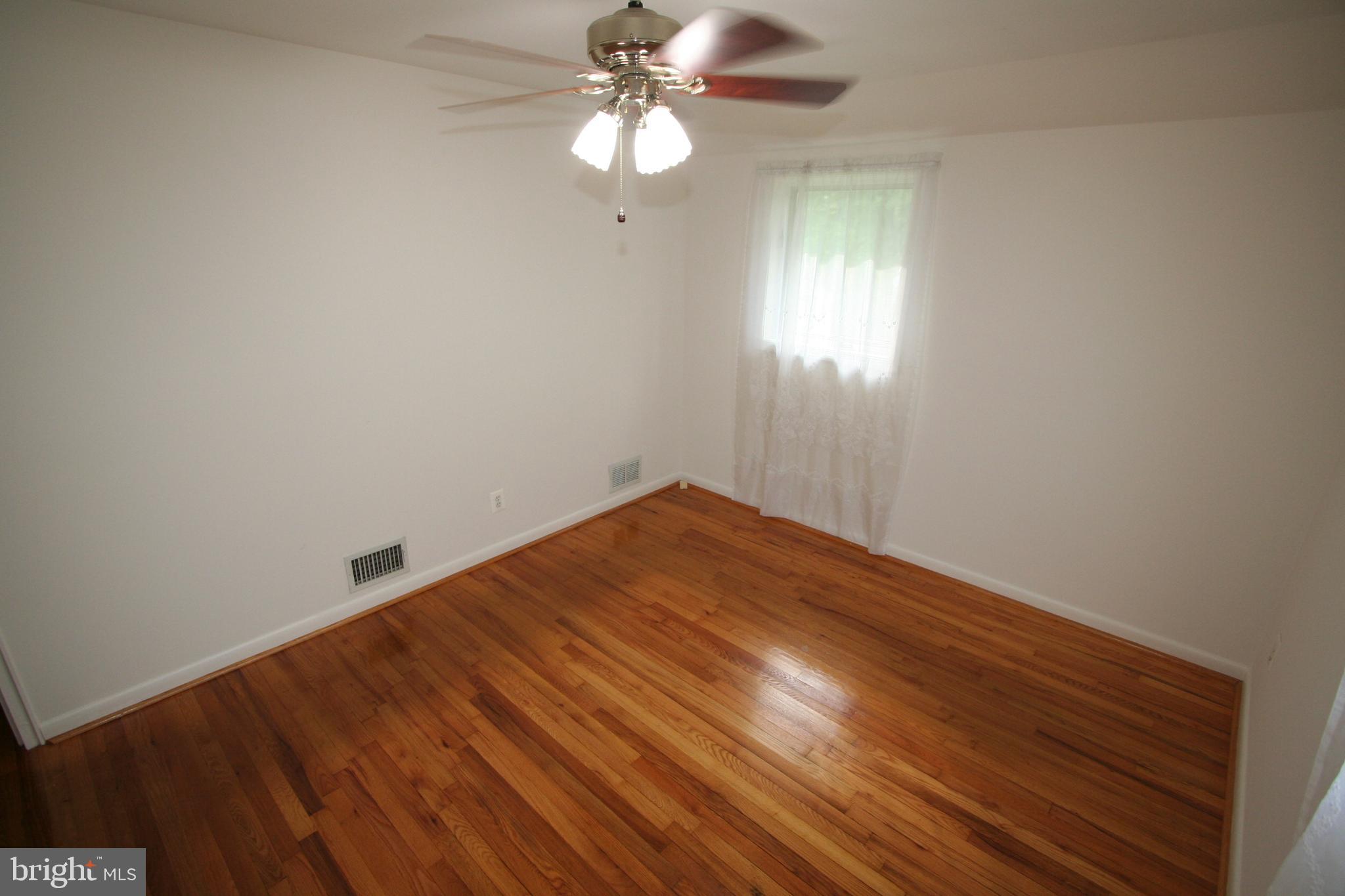 12718 Gould Road Silver Spring, MD 20906 - Photo 17 of 55 a view of empty room with window