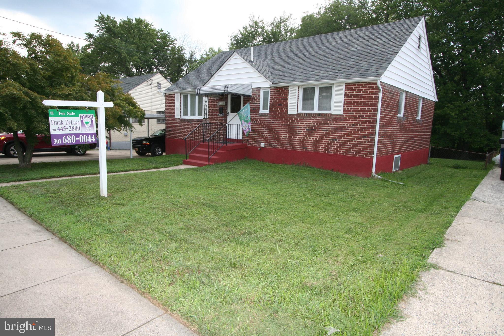 12718 Gould Road Silver Spring, MD 20906 - Photo 3 of 55 a view of a house with a backyard