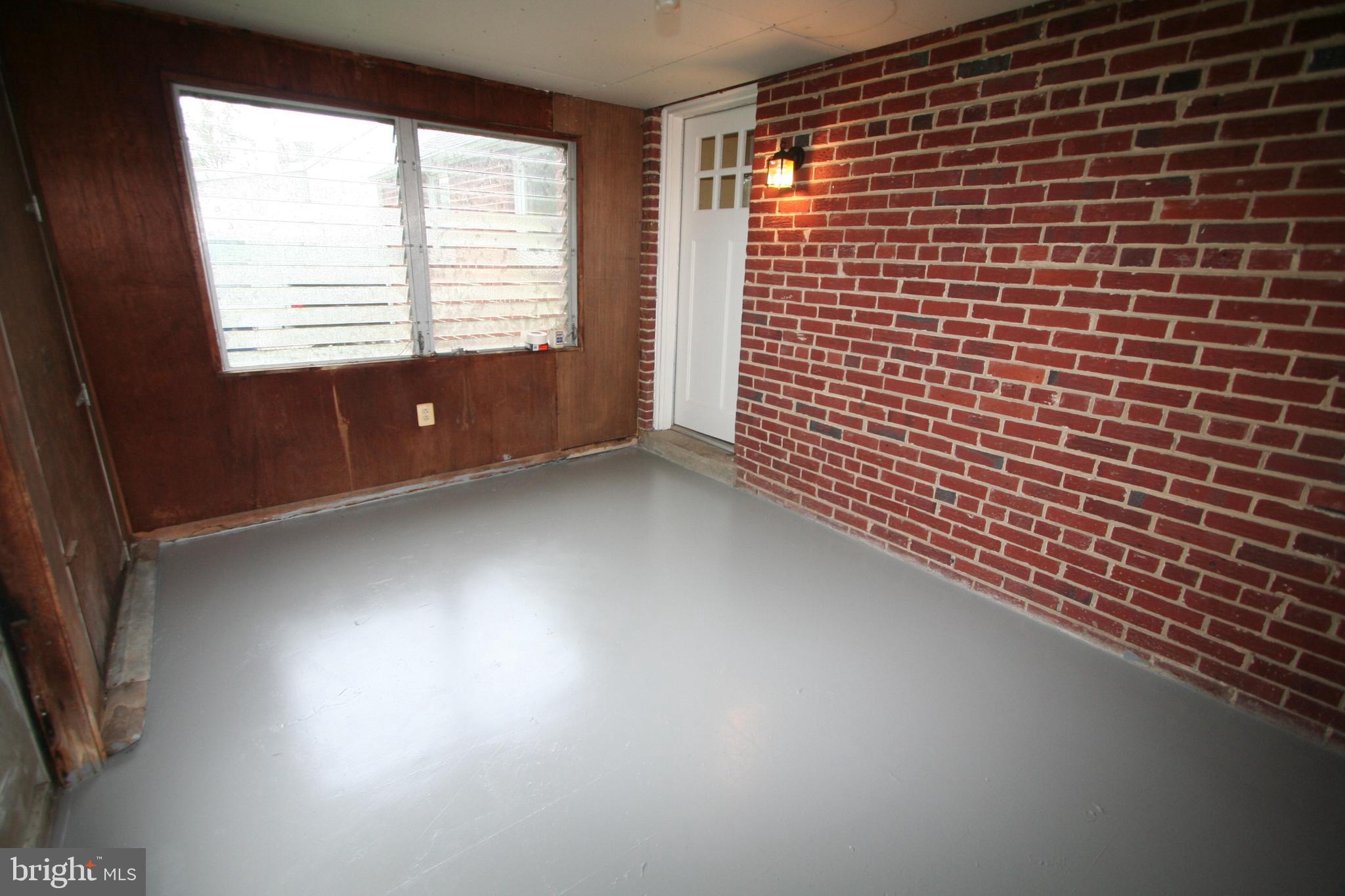 12718 Gould Road Silver Spring, MD 20906 - Photo 27 of 55 a view of an empty room with a window