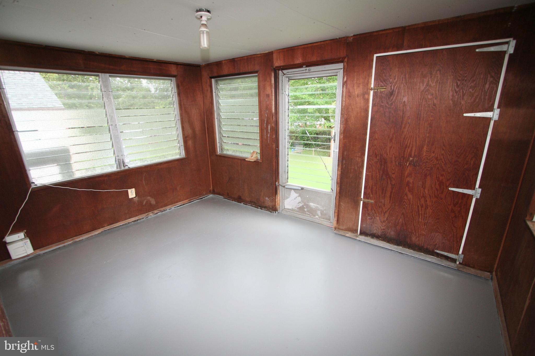 12718 Gould Road Silver Spring, MD 20906 - Photo 28 of 55 a view of an empty room with a window