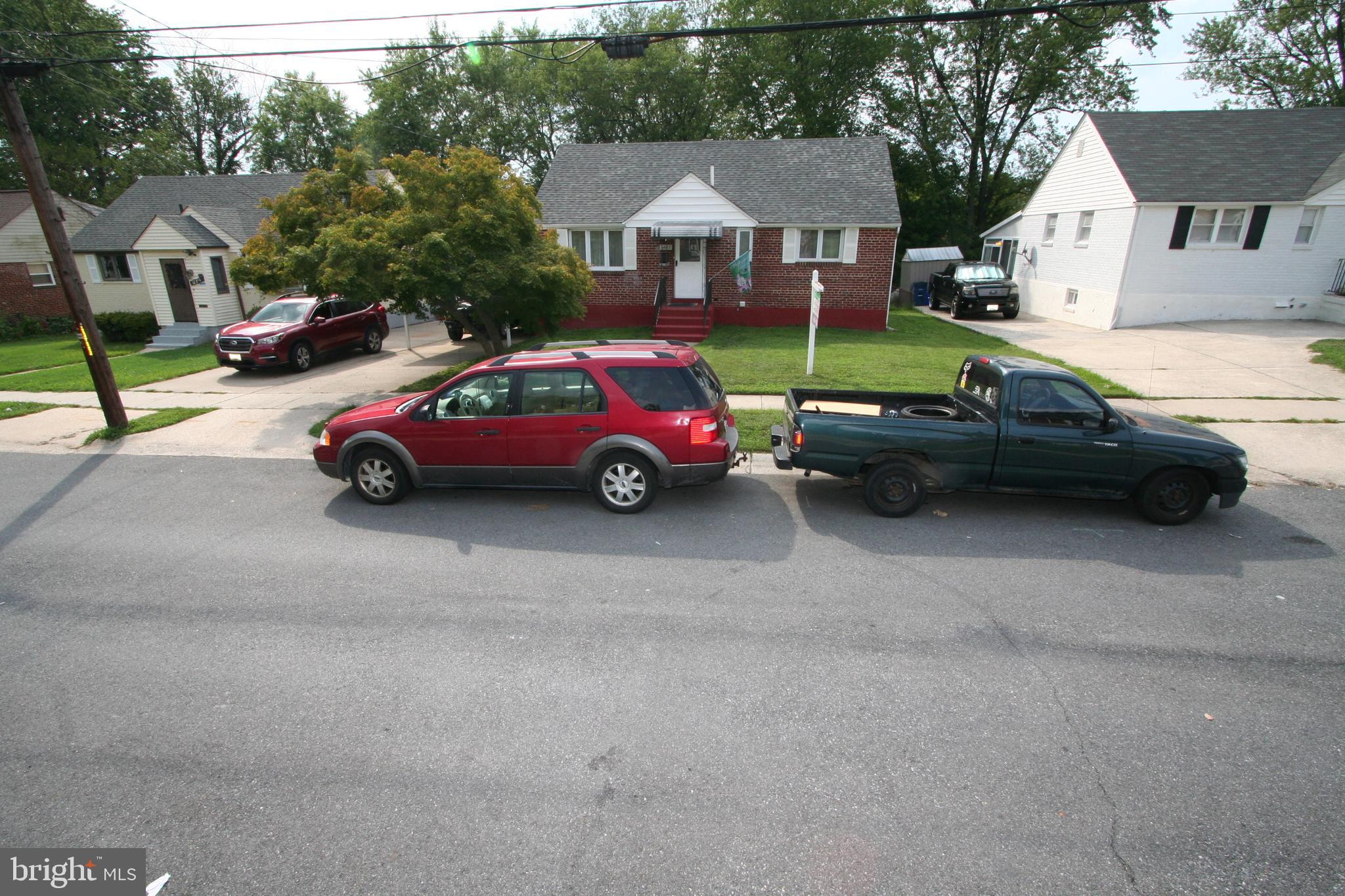 12718 Gould Road Silver Spring, MD 20906 - Photo 52 of 55 a car parked in front of a house