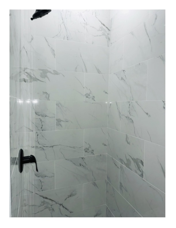 63 Water Street, Unit 33 Torrington, CT 06790 - Photo 5 of 5 a bathroom with a shower