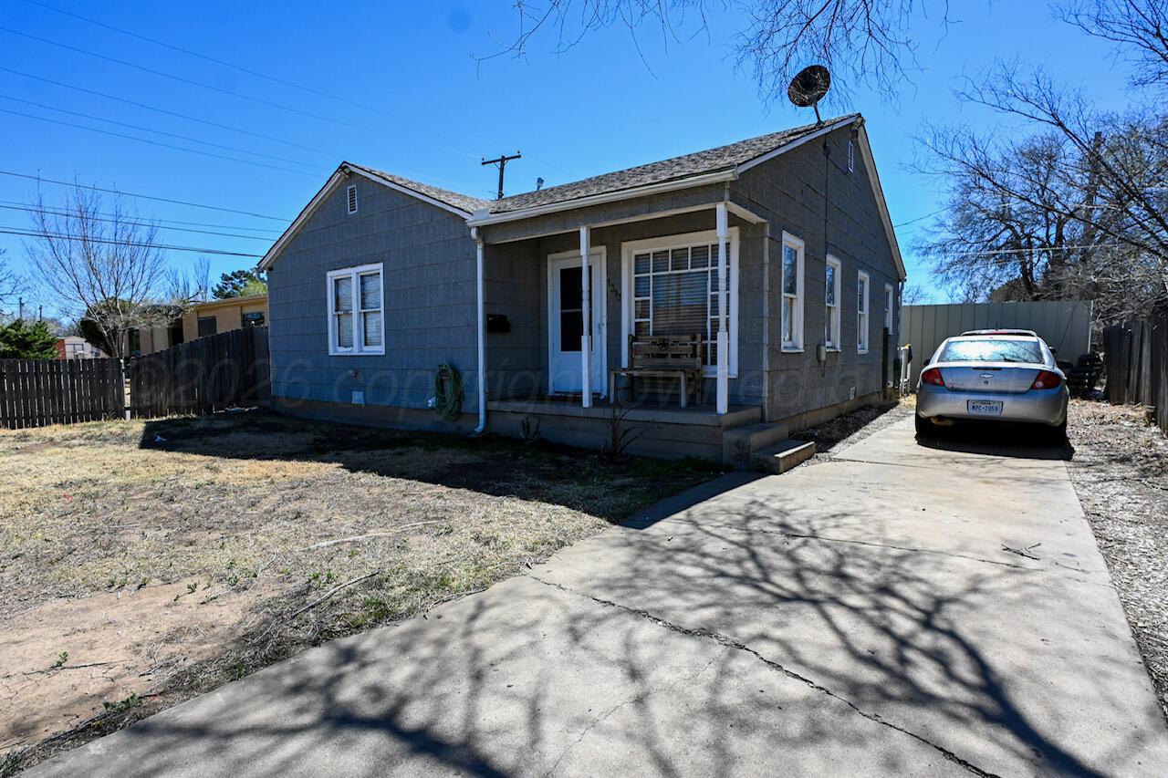 1313 Southwest 15th Avenue Amarillo, TX 79102 - Photo 6 of 15 a view of a house with a yard