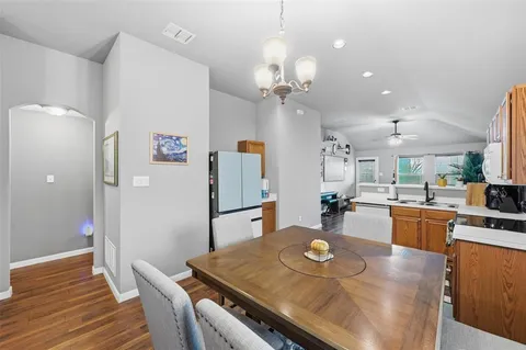 a view of a dining room with furniture