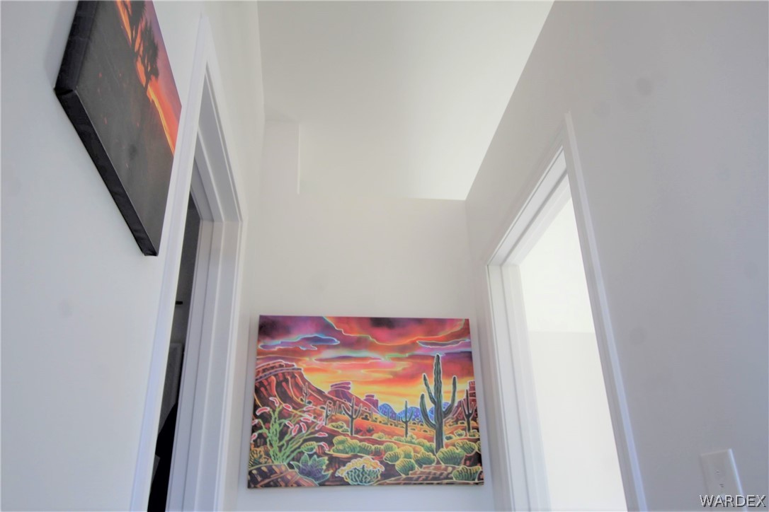 11722 Suzette Road Yucca, AZ 86438 - Photo 11 of 29 a view of painting on the wall
