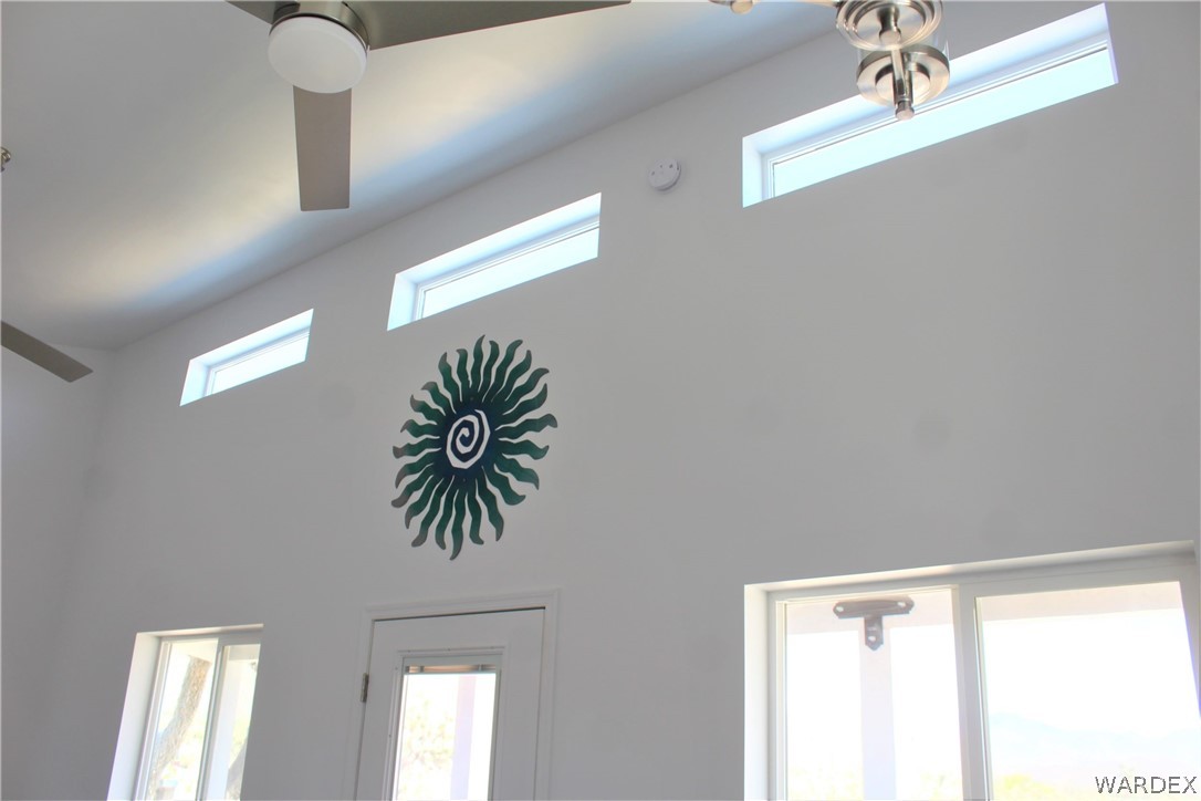 11722 Suzette Road Yucca, AZ 86438 - Photo 20 of 29 a view of a hallway with a window