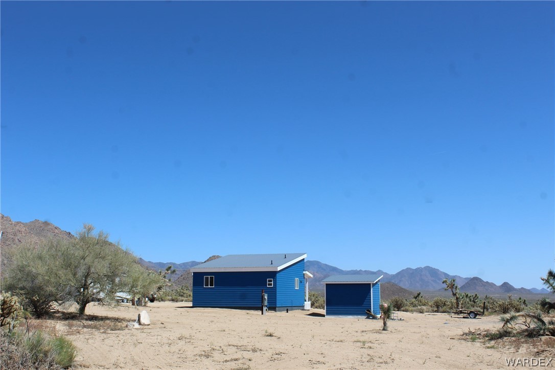11722 Suzette Road Yucca, AZ 86438 - Photo 4 of 29 a house with a outdoor space
