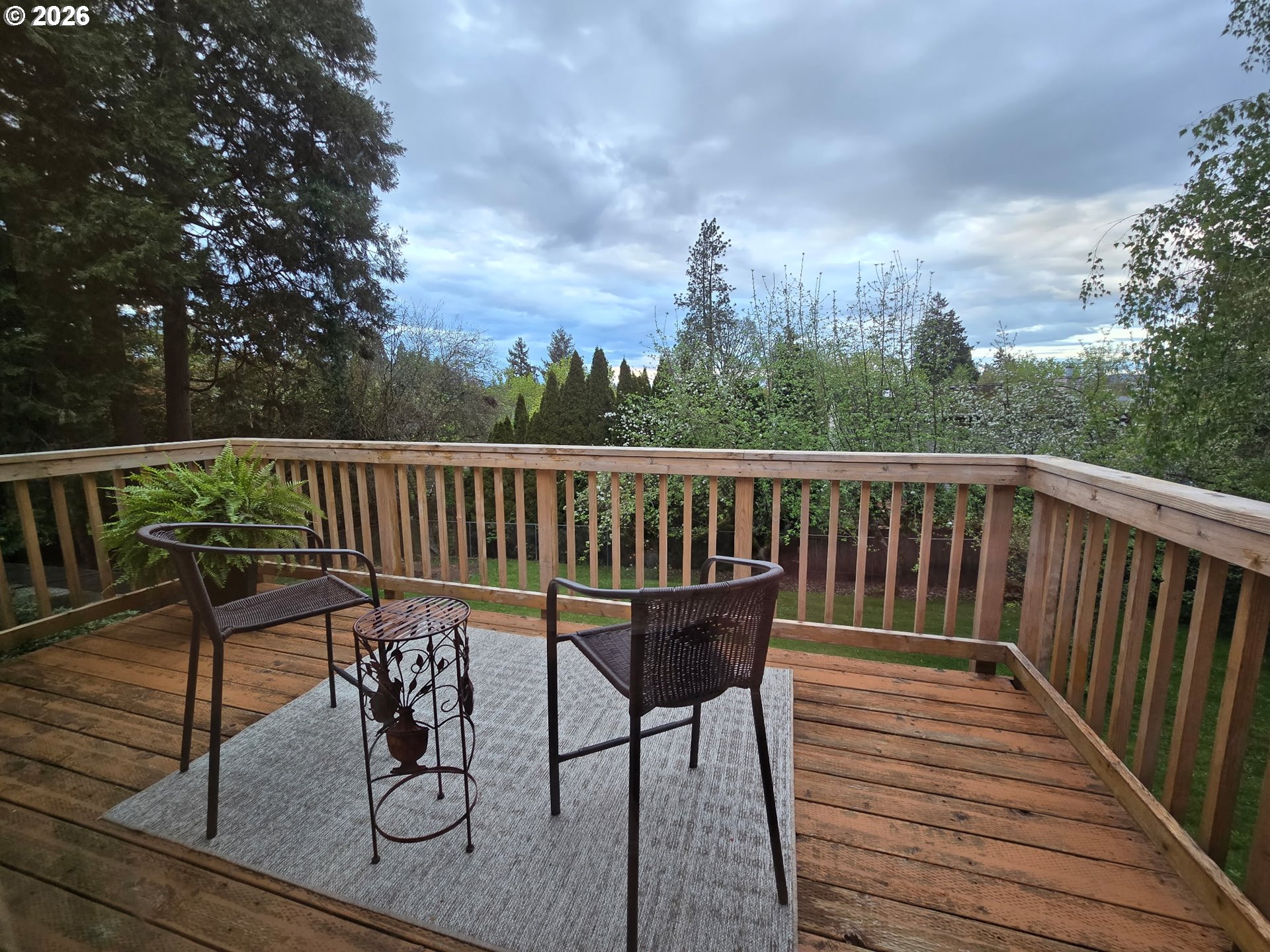 16285 Southwest Rosa Road Beaverton, OR 97007 - Photo 16 of 20 a view of a chairs on wooden deck