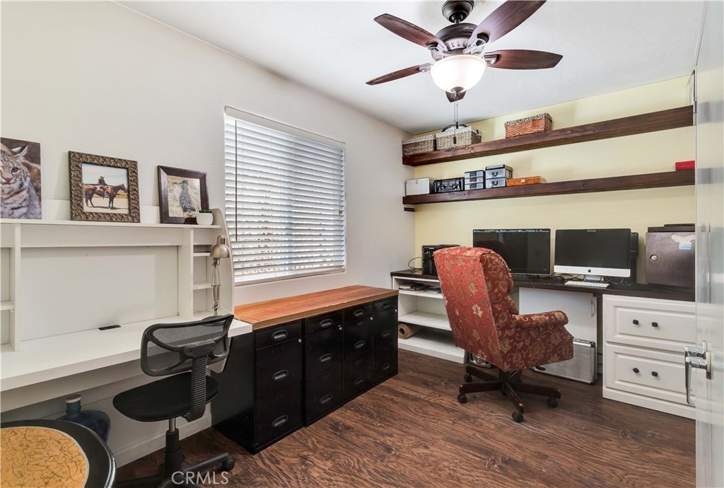 57490 Redondo Street Yucca Valley, CA 92284 - Photo 28 of 60 a view of a workspace with furniture and a window