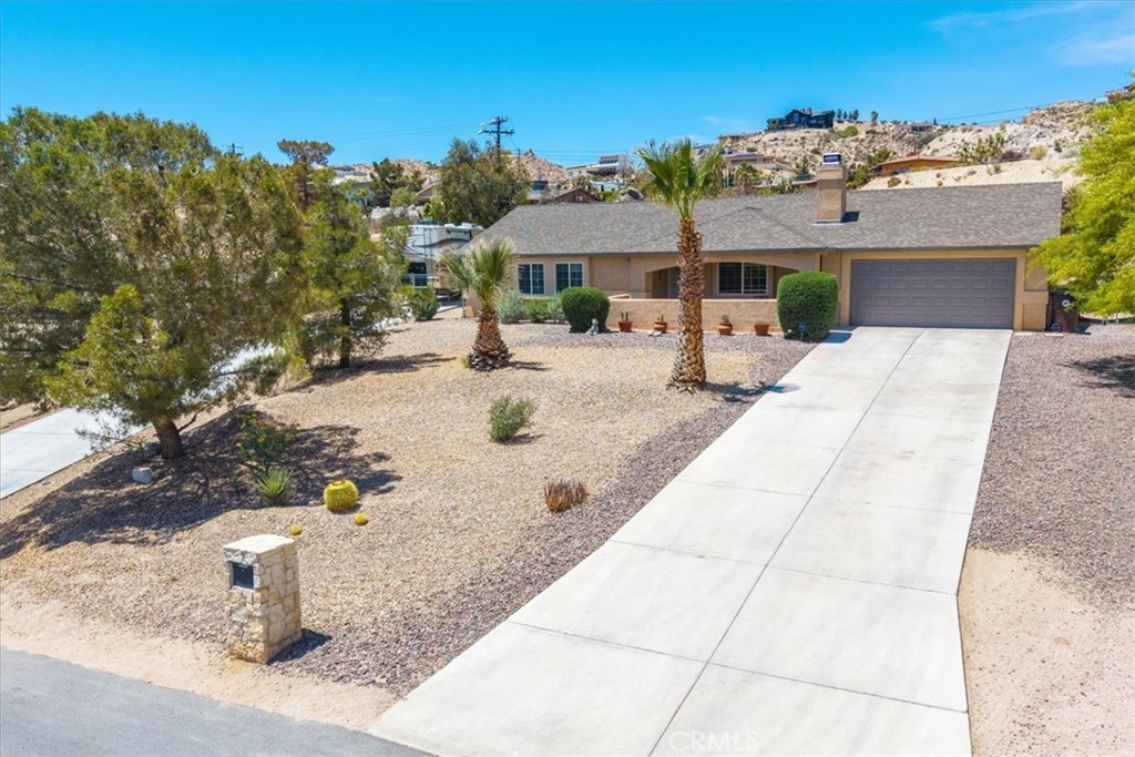 57490 Redondo Street Yucca Valley, CA 92284 - Photo 4 of 60 a view of house with outdoor space