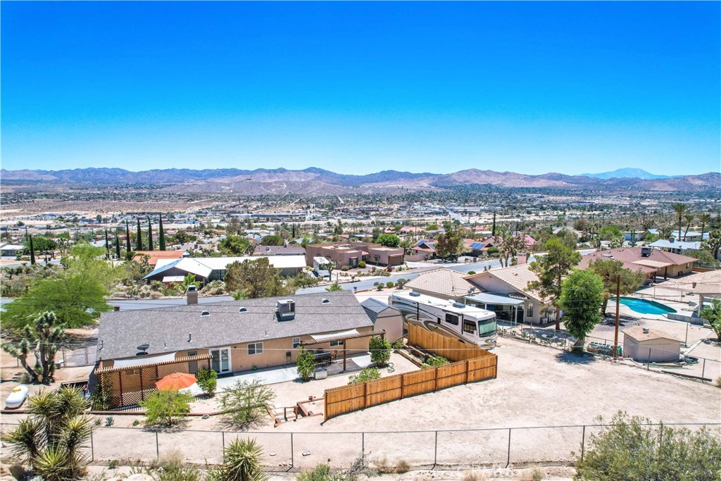 57490 Redondo Street Yucca Valley, CA 92284 - Photo 51 of 60 a view of a city with mountains
