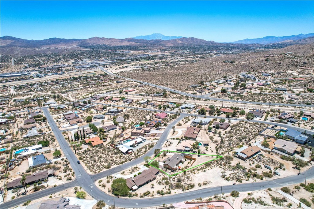 57490 Redondo Street Yucca Valley, CA 92284 - Photo 56 of 60 a view of a city with mountain