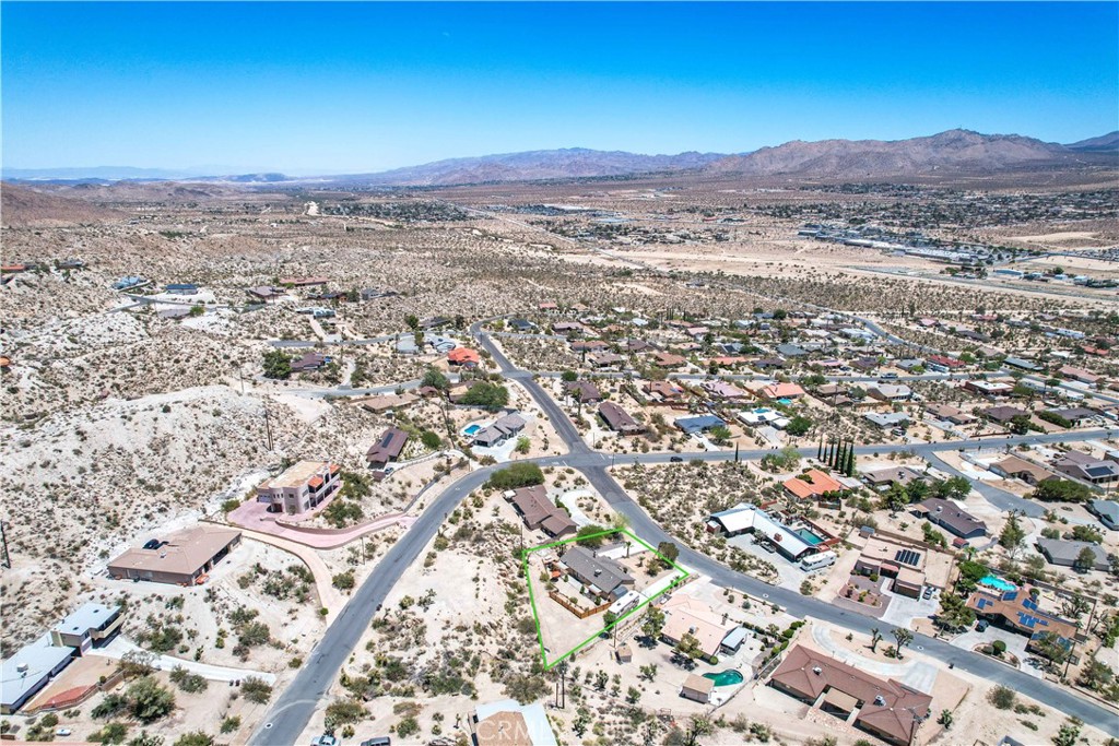 57490 Redondo Street Yucca Valley, CA 92284 - Photo 58 of 60 an aerial view of residential building and trees