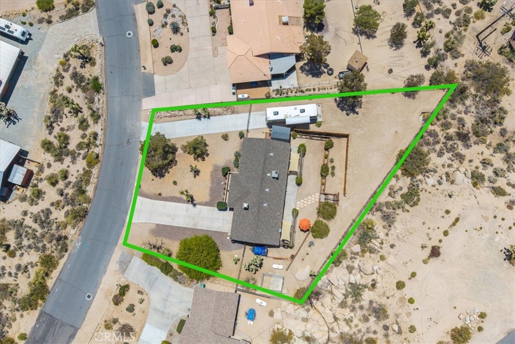 57490 Redondo Street Yucca Valley, CA 92284 - Photo 59 of 60 an aerial view of residential houses with outdoor space