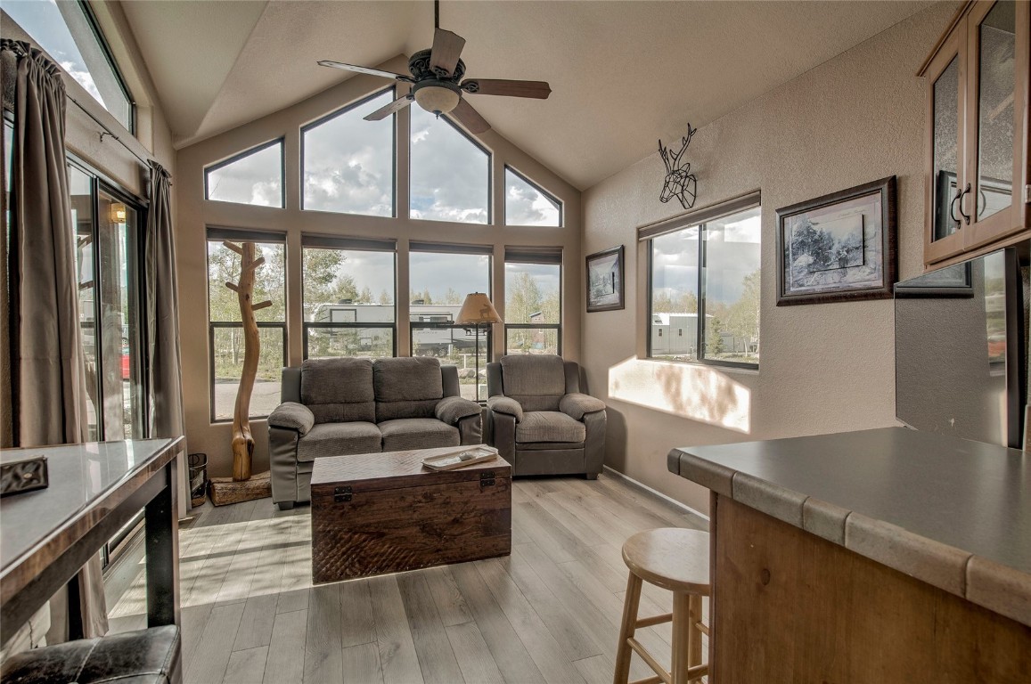 122 Sunshine Loop Fairplay, CO 80440 - Photo 11 of 28 a living room with furniture large window and wooden floor