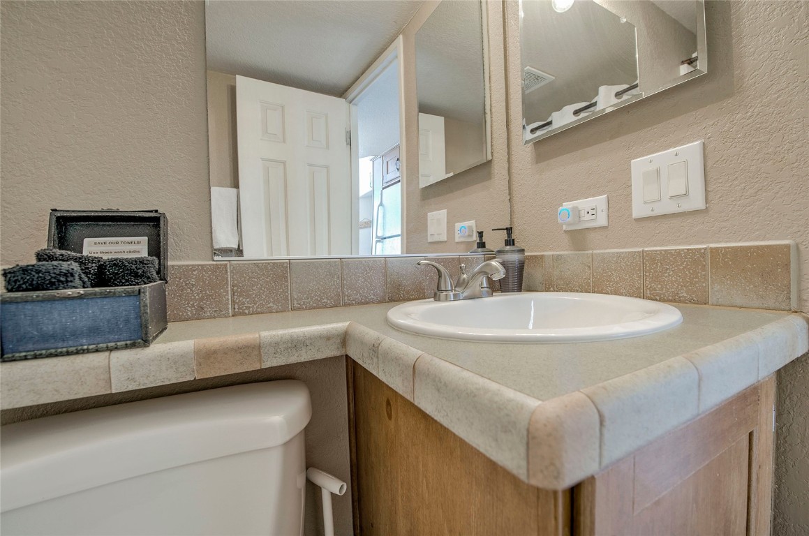122 Sunshine Loop Fairplay, CO 80440 - Photo 13 of 28 a kitchen with a sink and a refrigerator