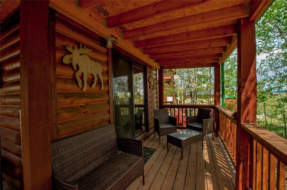 122 Sunshine Loop Fairplay, CO 80440 - Photo 22 of 28 a balcony with wooden floor