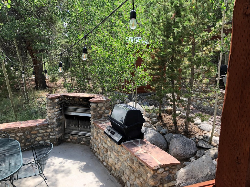 122 Sunshine Loop Fairplay, CO 80440 - Photo 25 of 28 a balcony with furniture and a potted plant