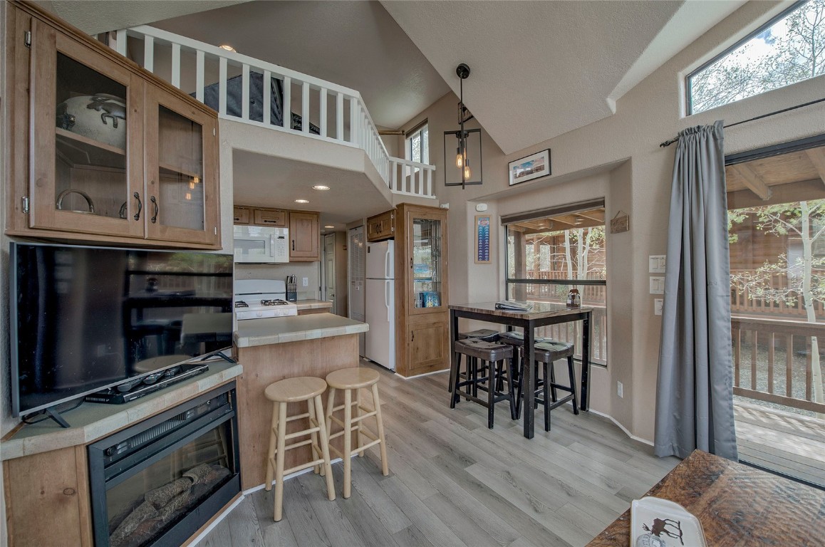 122 Sunshine Loop Fairplay, CO 80440 - Photo 5 of 28 a view of a dining room with furniture window and wooden floor