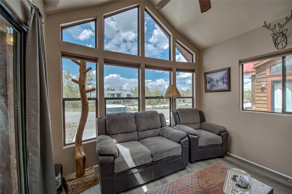 122 Sunshine Loop Fairplay, CO 80440 - Photo 10 of 28 a living room with furniture and a large window