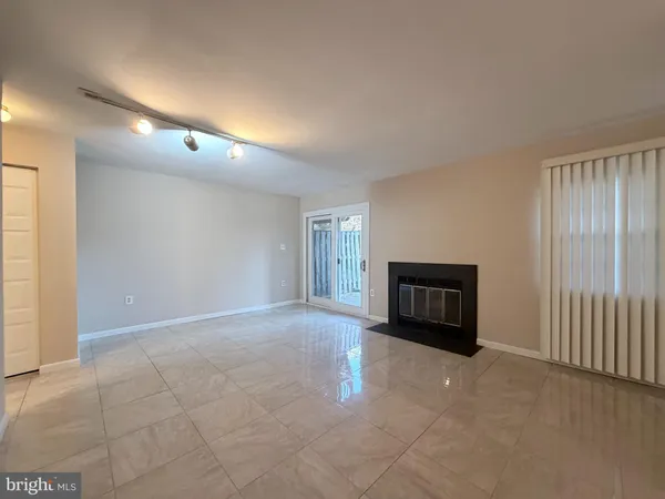 a view of livingroom with a fireplace