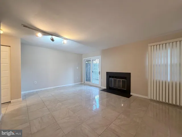 a view of livingroom with a fireplace